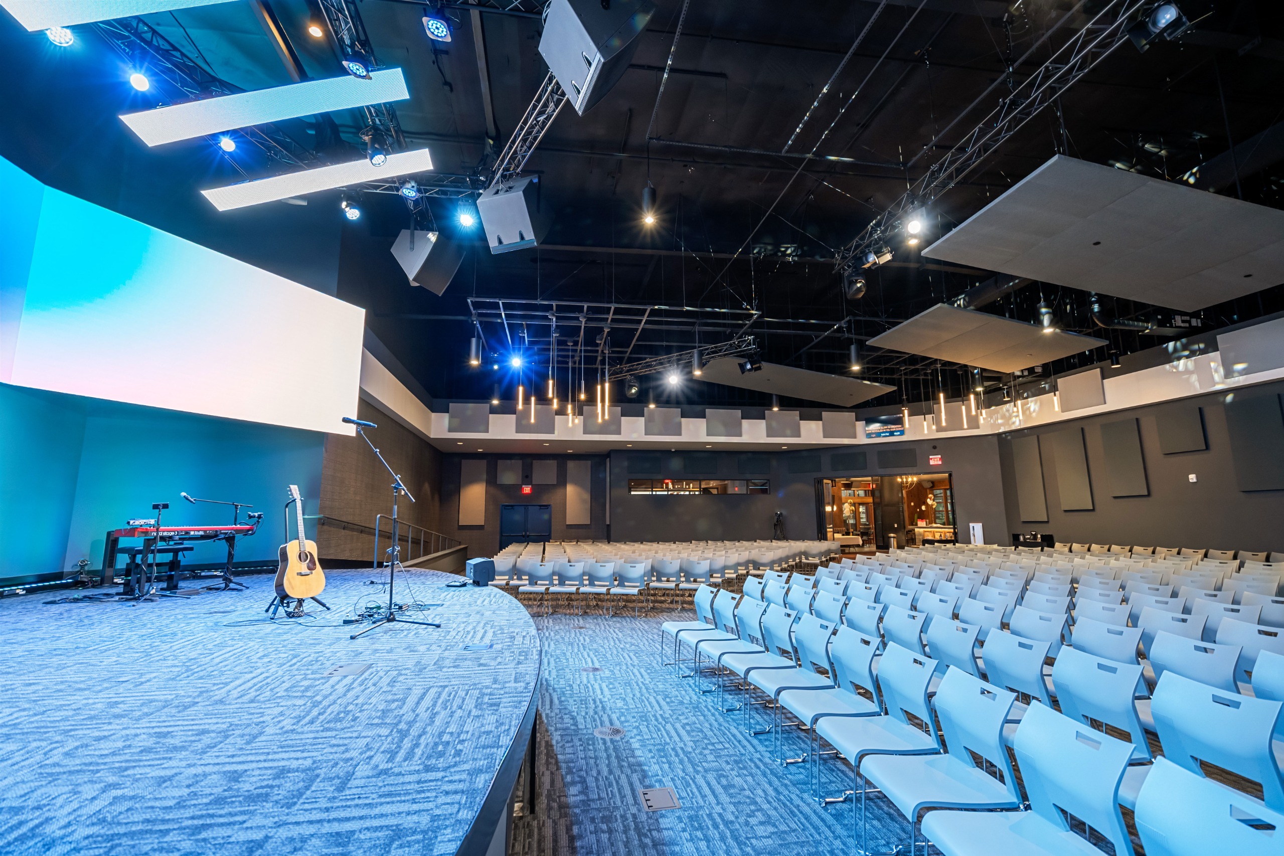A church auditorium amps up for musical performances.