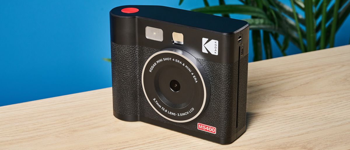 A black Kodak Mini Shot 4 Era 2-in-1 instant camera and printer