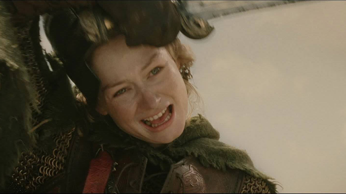 Eowyn taking off her helmet in The Lord of the Rings: The Return of the King