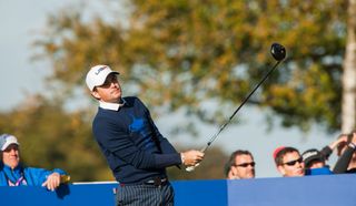 Keegan Bradley hits a tee shot with a driver during the 2014 Ryder Cup