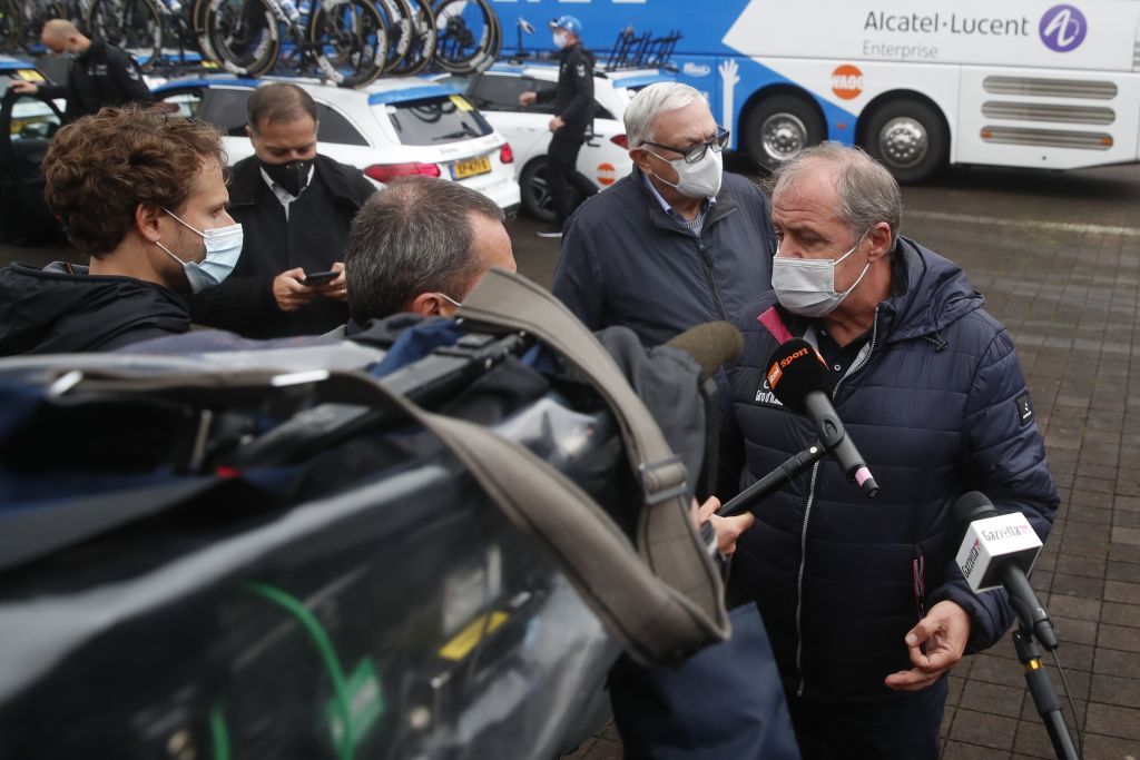 Director of the Giro dItalia Mauro Vegni R talks to the press before the 19th stage of the Giro dItalia 2020 cycling race a 258kilometer route between Morbegno and Asti on October 23 2020 Heavy rain has interrupted on October 23 2020 the 19th stage of the Giro dItalia following protests by the riders in the face of difficult weather conditions Todays stage was planned to be a flat 258km ride between Morbegno and Asti but was cut back 100km after riders revolted when faced with pelting rain in the northern region of Lombardy Photo by Luca Bettini AFP Photo by LUCA BETTINIAFP via Getty Images