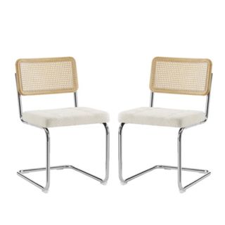 Two metal chairs with white seats and woven backs