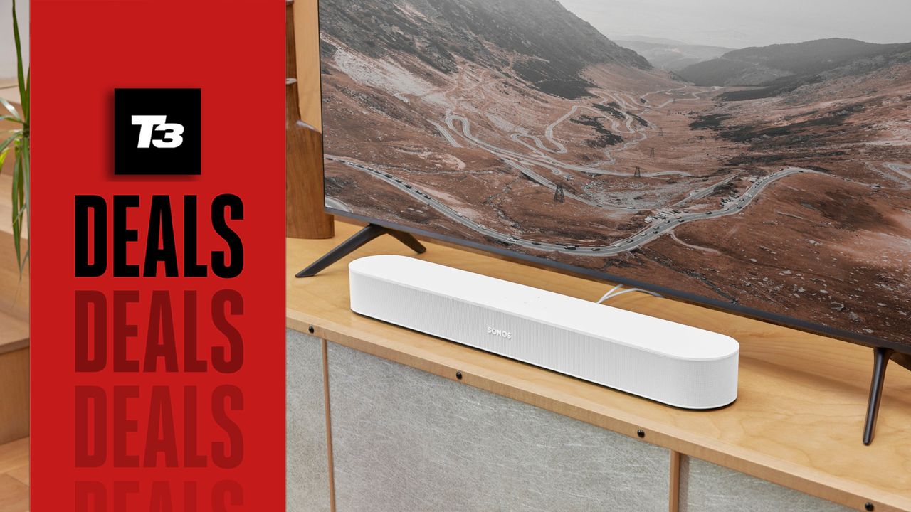 Sonos Beam soundbar in white colourway on cabinet under 4K TV