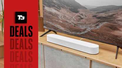 Sonos Beam soundbar in white colourway on cabinet under 4K TV