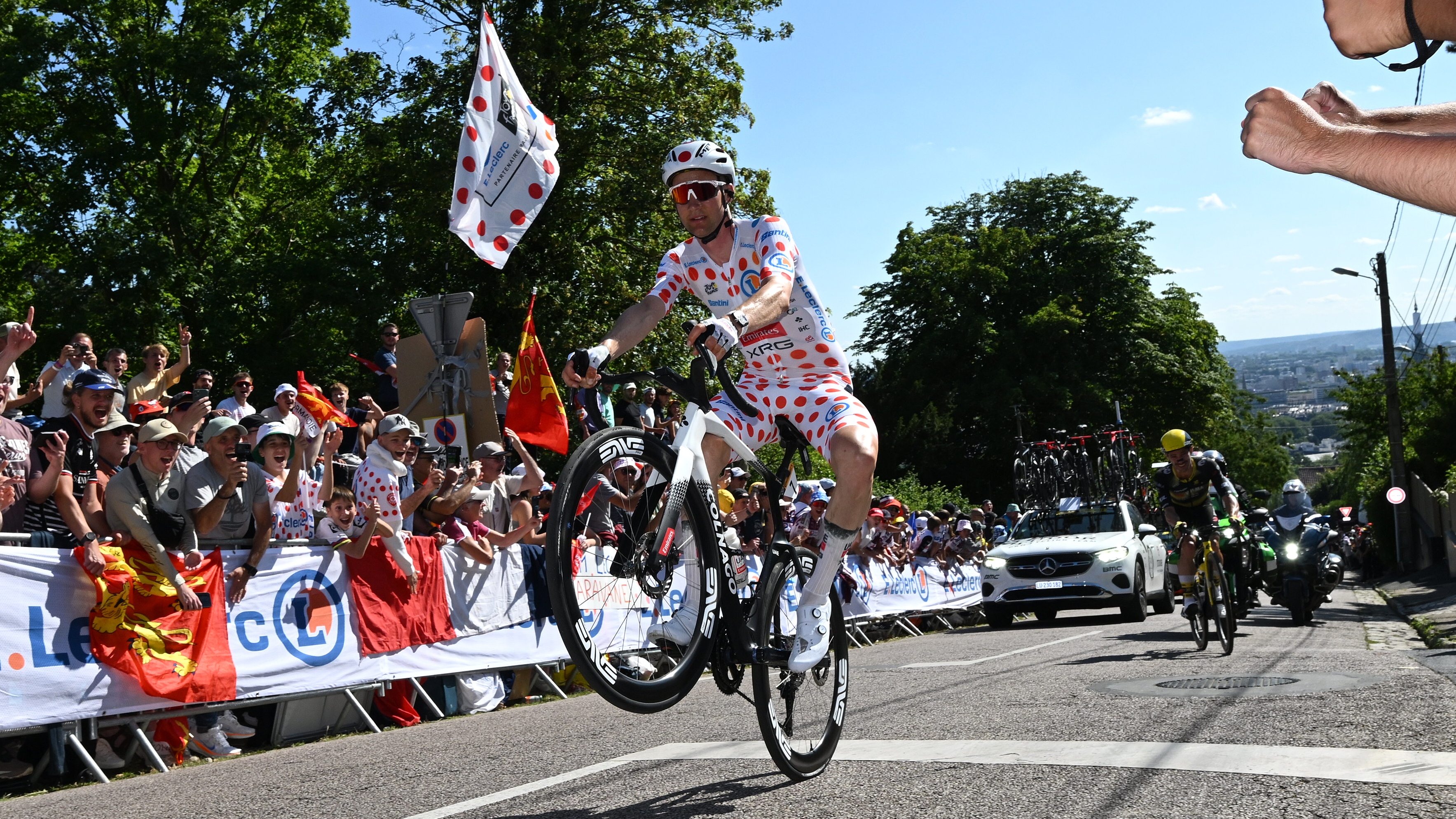 Tim Wellens of Belgium and UAE Team Emirates - XRG - Polka dot Mountain Jersey competes while fans cheers during the 112th Tour de France, Stage 4 a 174.2km stage from Amiens Metropole to Rouen