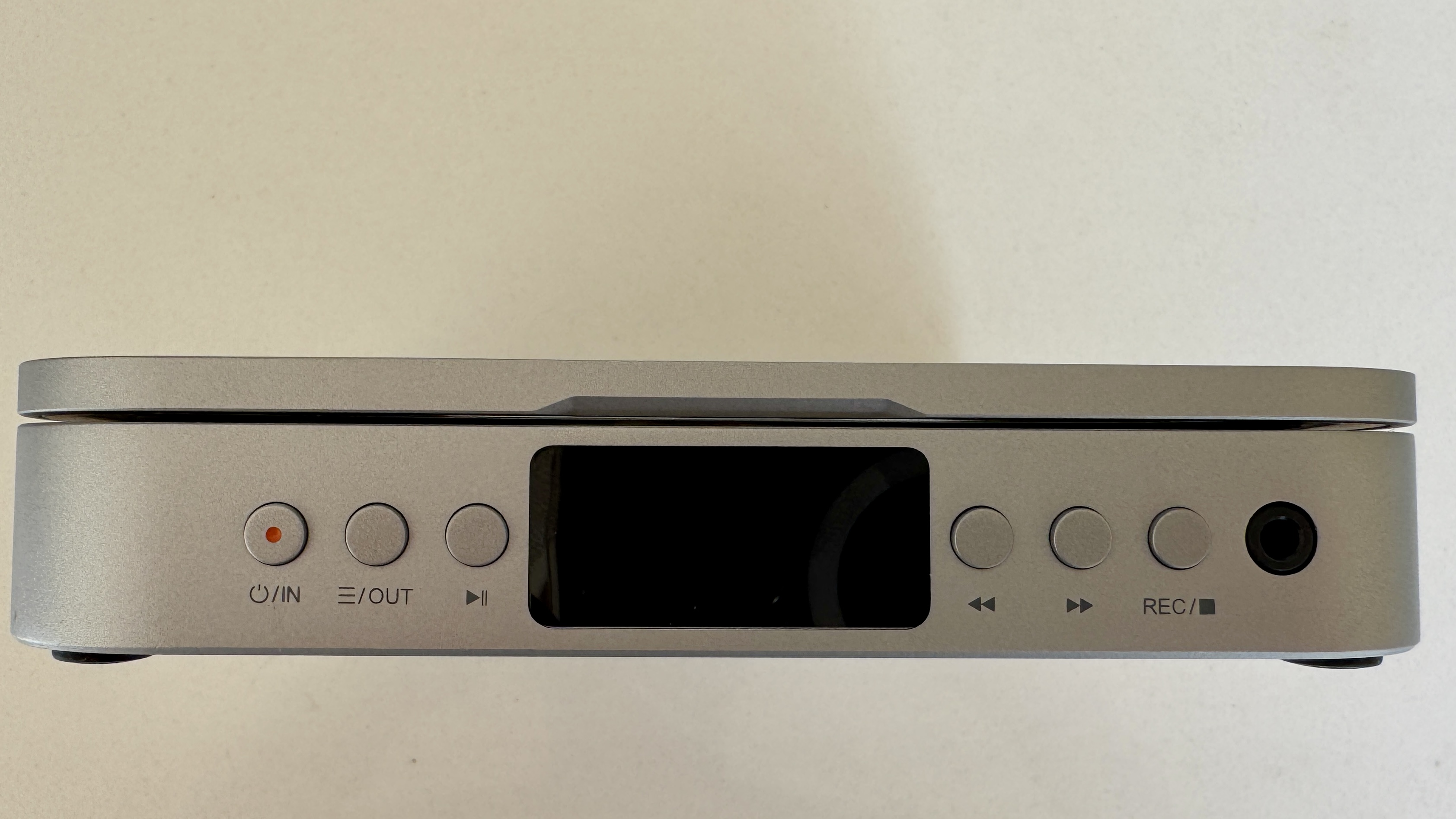 Front panel of the Fosi Audio Merak CD player, showing various buttons including power on, line-out, skip track, forwards, backwards, record, and a 3.5mm headphone jack.