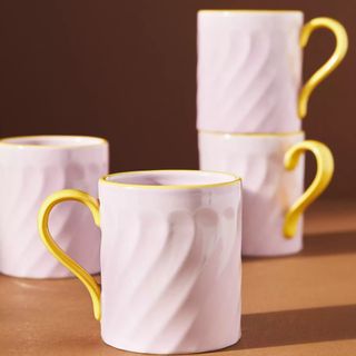 Anthropologie lilac and yellow set of mugs