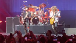 Kirk Hammett onstage with Journey