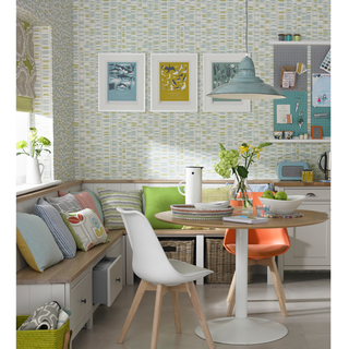 kitchen with graphic print wallpaper and round table