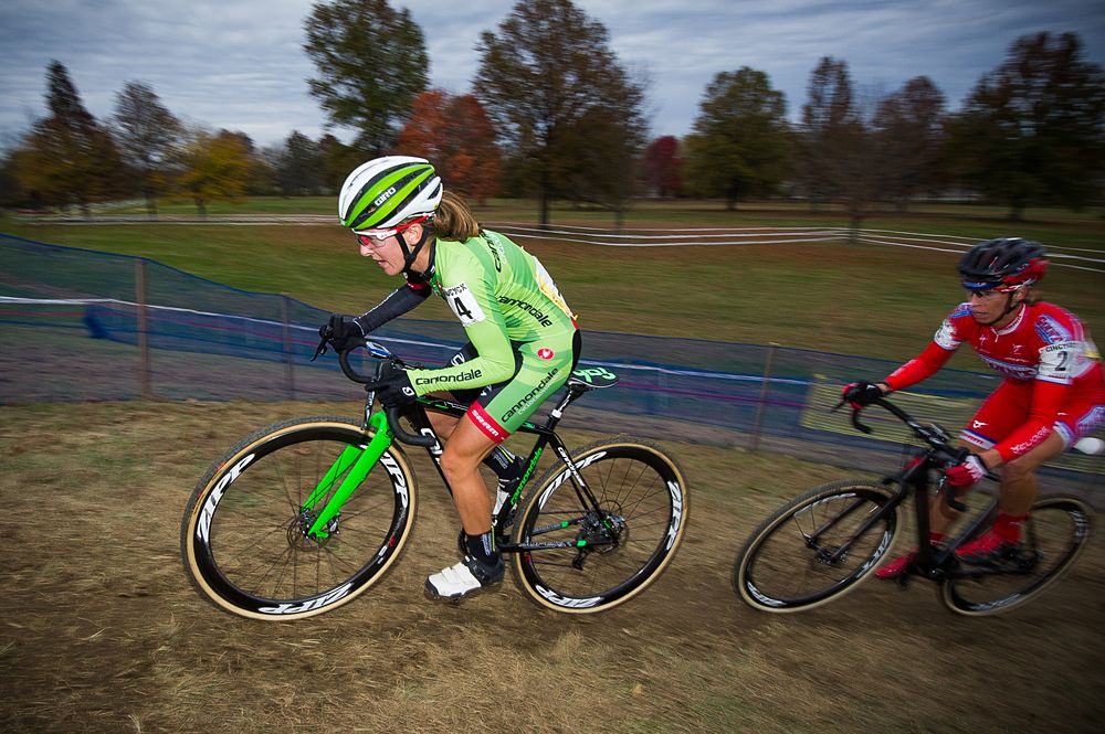 Katitlin Antonneau (Cannondale pb Cyclocrossworld) leads Rachel Lloyd (Calgiant) up the hill.