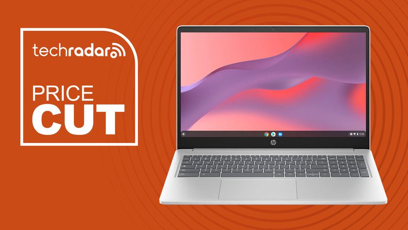 HP Chromebook Laptop 15a in silver on orange background with TechRadar price cut sign