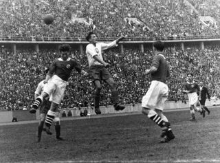 Italy take on Austria at the 1936 Olympics in Berlin.