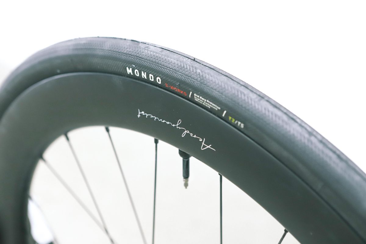 a close up of a black road bike tyre