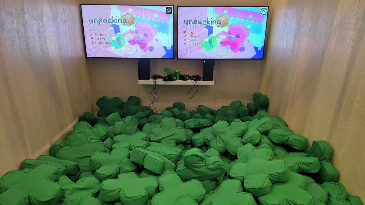 A pool filled with Xbox D-pad cushions from the IKEA collection.