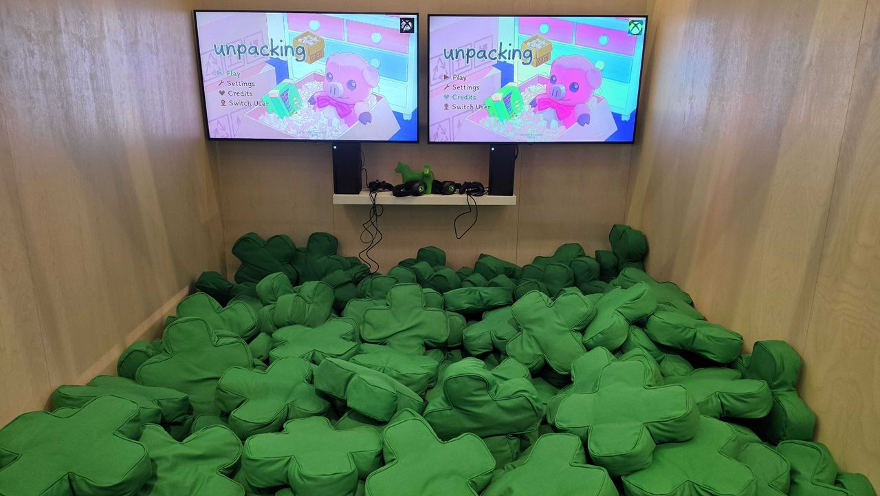 A pool filled with Xbox D-pad cushions from the IKEA collection.