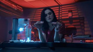 Rachel Weisz surrounded by lab equipment in Dead Ringers