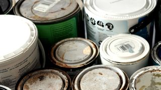 Various tins of old paint