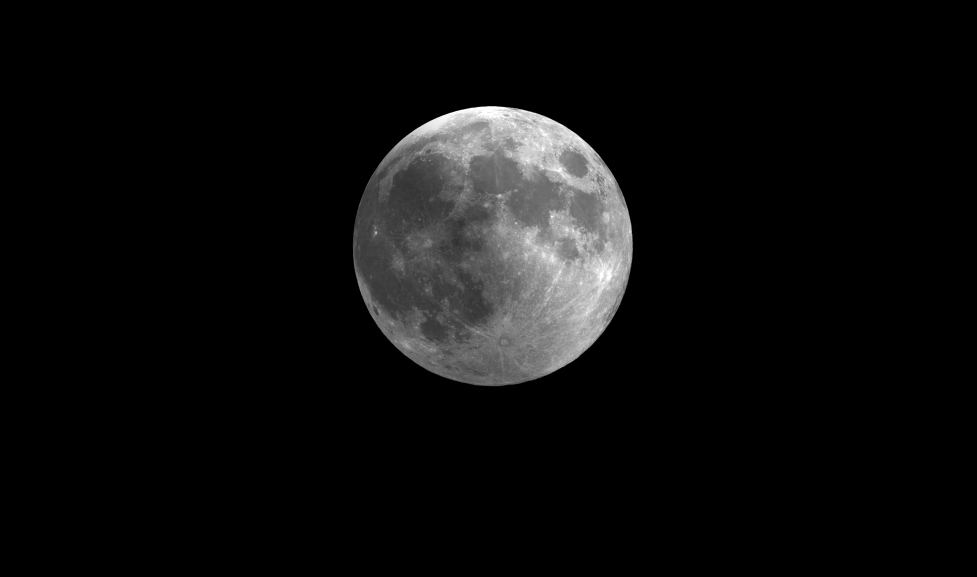 This still from a video skywatching guide shows how the penumbral lunar eclipse of Nov. 28 will slightly darken the full moon. 