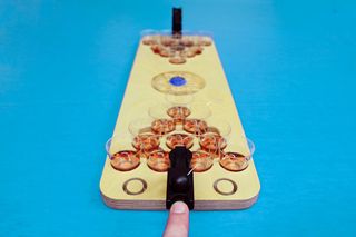 Raise your beer pong game even further by playing with absinthe