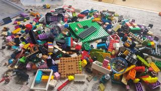 LEGO VS LEGO DUPLO illustrated by Pile of LEGO