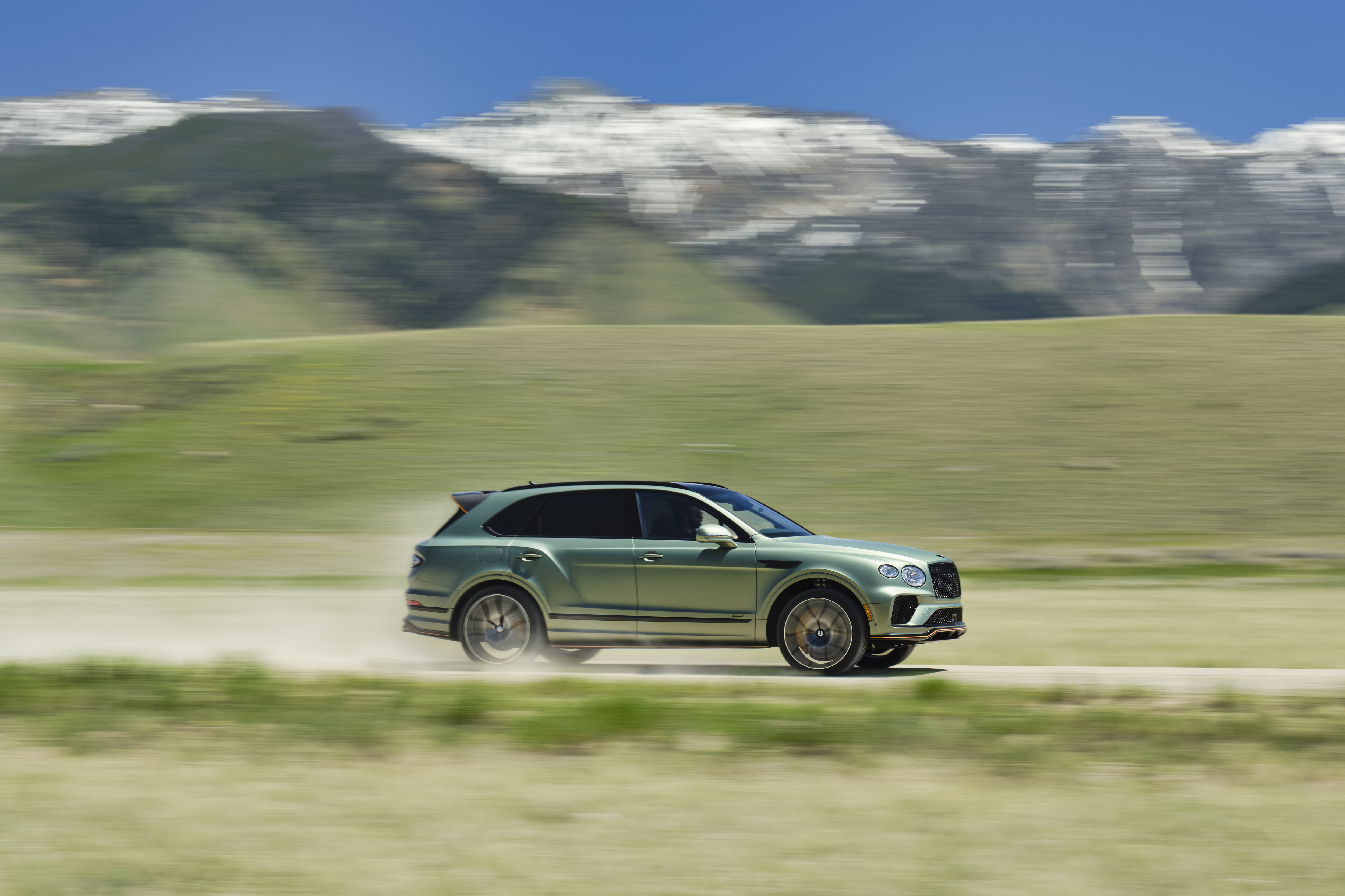 Detail of the Bentley Bentayga, in Alpine satin green, in Yellowstone National Park