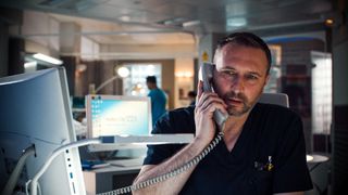 Fletch phones Regina. Is he ready to call time on Holby City?