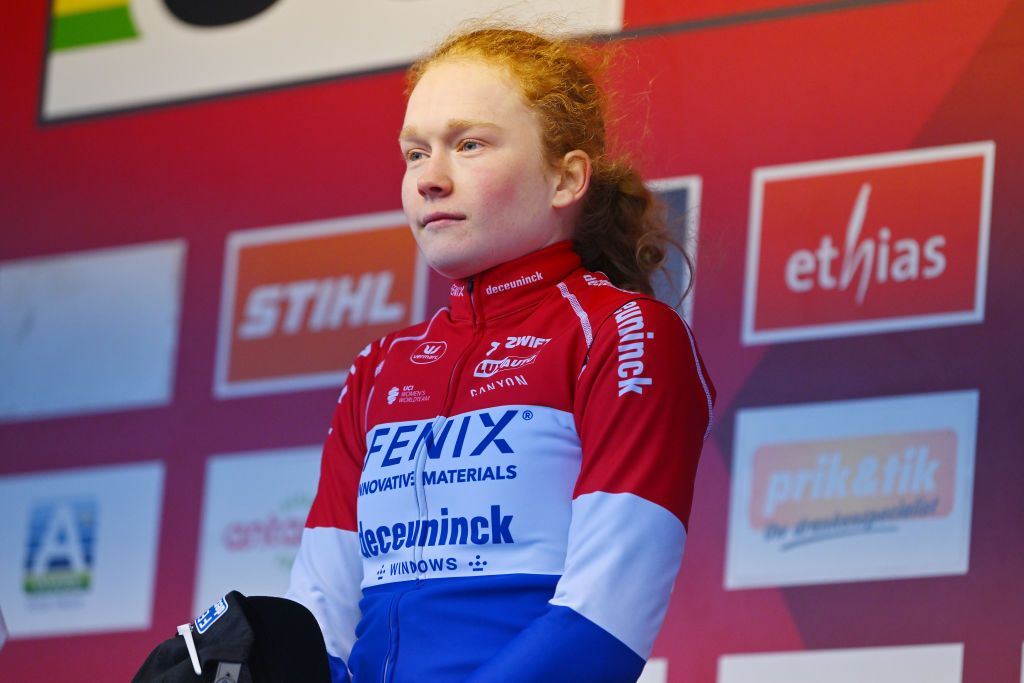 ZONHOVEN BELGIUM JANUARY 07 Puck Pieterse of The Netherlands and Team FenixDeceuninck celebrates at podium as race winner during the 27th Zonhoven UCI CycloCross Worldcup 2024 Womens Elite on January 07 2024 in Zonhoven Belgium Photo by Luc ClaessenGetty Images