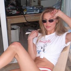 Bella Hadid wearing a white T-shirt and swimsuit in Cannes