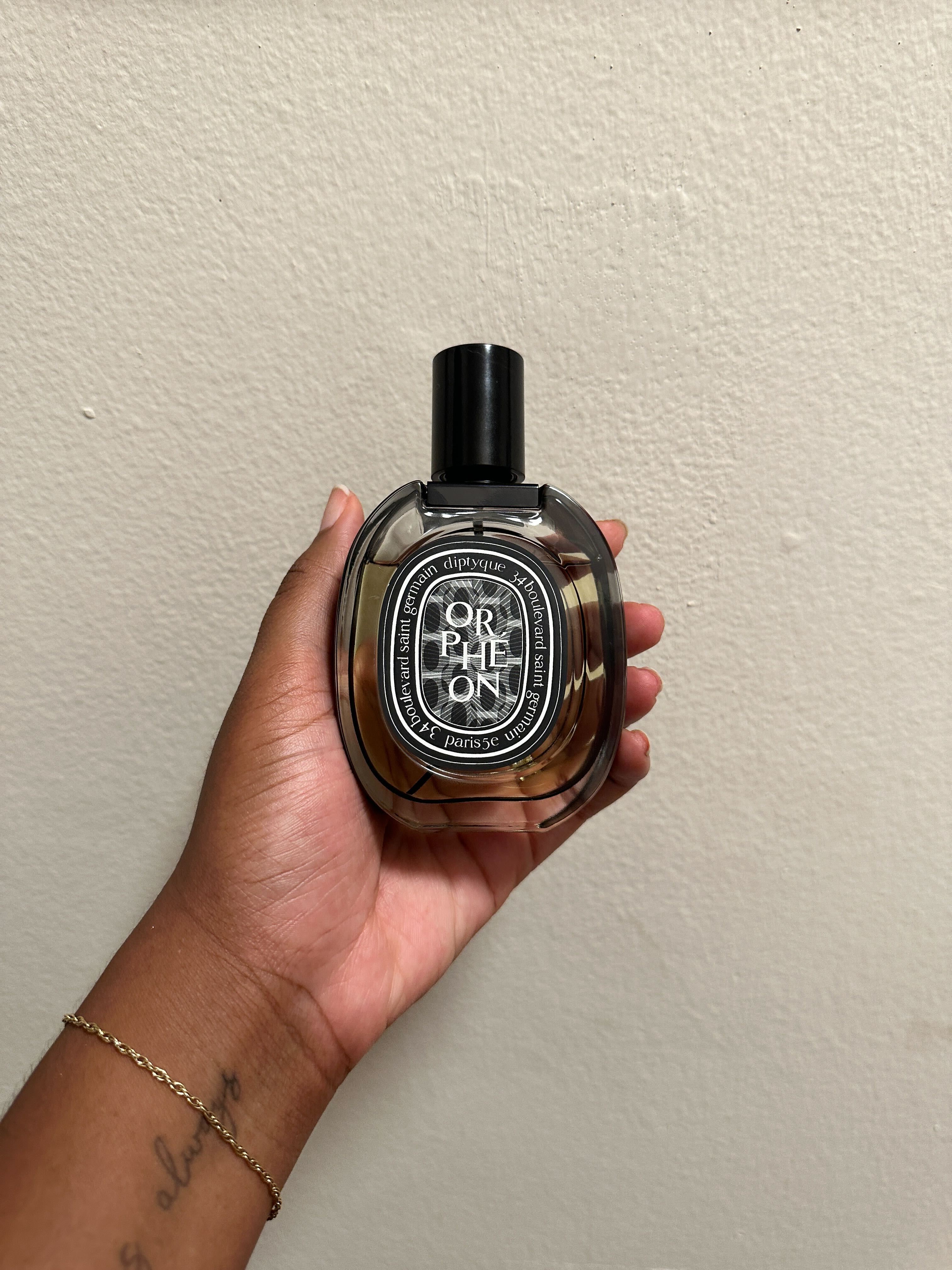 Ariel Baker testing Diptyque&#039;s Orpheon perfume.