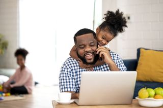 Dad with school child before schools go back after lockdown