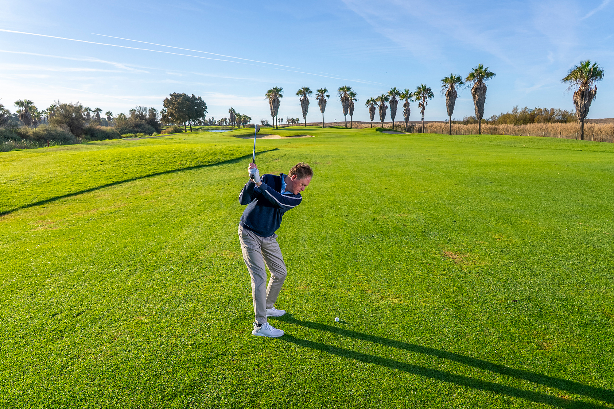 Keith Wood at the top of his backswing with a wedge
