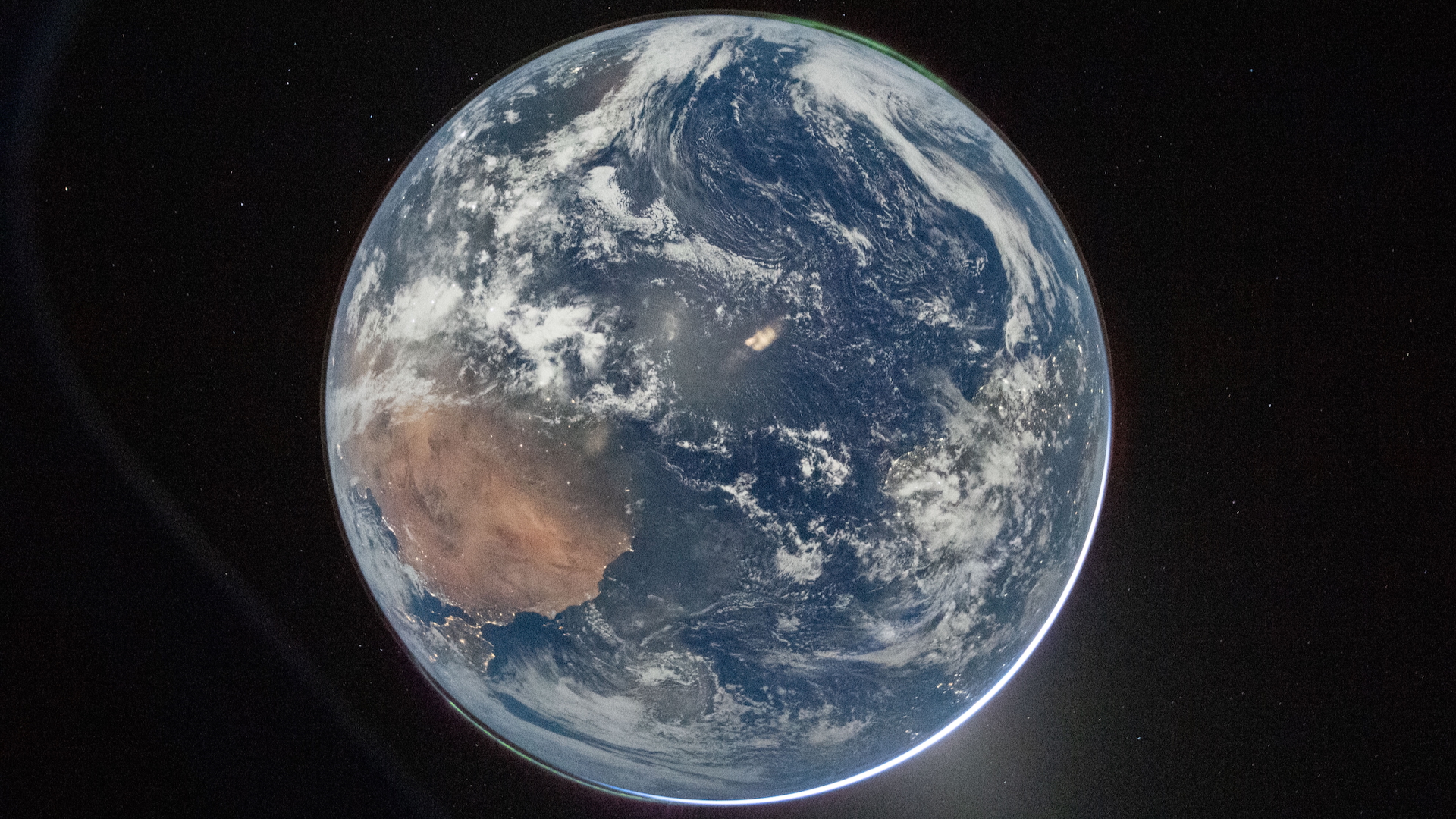Planet Earth photographed from the Artemis II space craft window