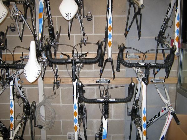 Garmin's Paris-Roubaix bikes have a section of wall space to themselves. They were brought to the Tour de France for stage 3 over the cobbles. Note the padded handlebar tape and dual braking system.