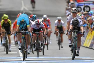 Luis Leon Sanchez and Peter Sagan throw their bikes for the line during stage 3 at the Tour Down under. Sagan got the win.