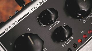 Closeup of the attack and release dials of the Cali76 compressor by Origin Effects