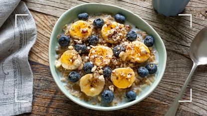 Bananas and blueberries sitting in a bowl of wholegrain porridge, which sit among the foods rich in magnesium
