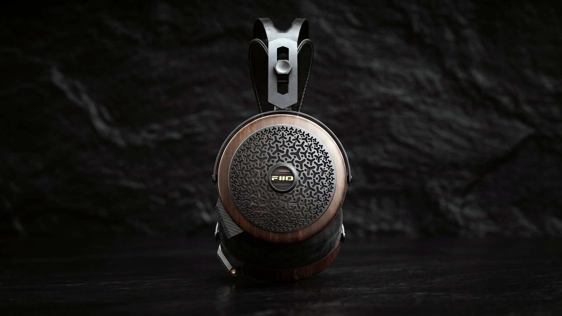 A side view of the Fiio FT15 on a black background.
