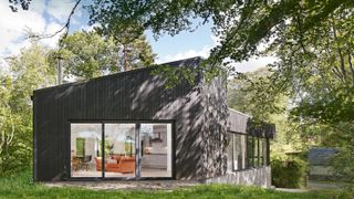 dark timber cladding on contemporary house