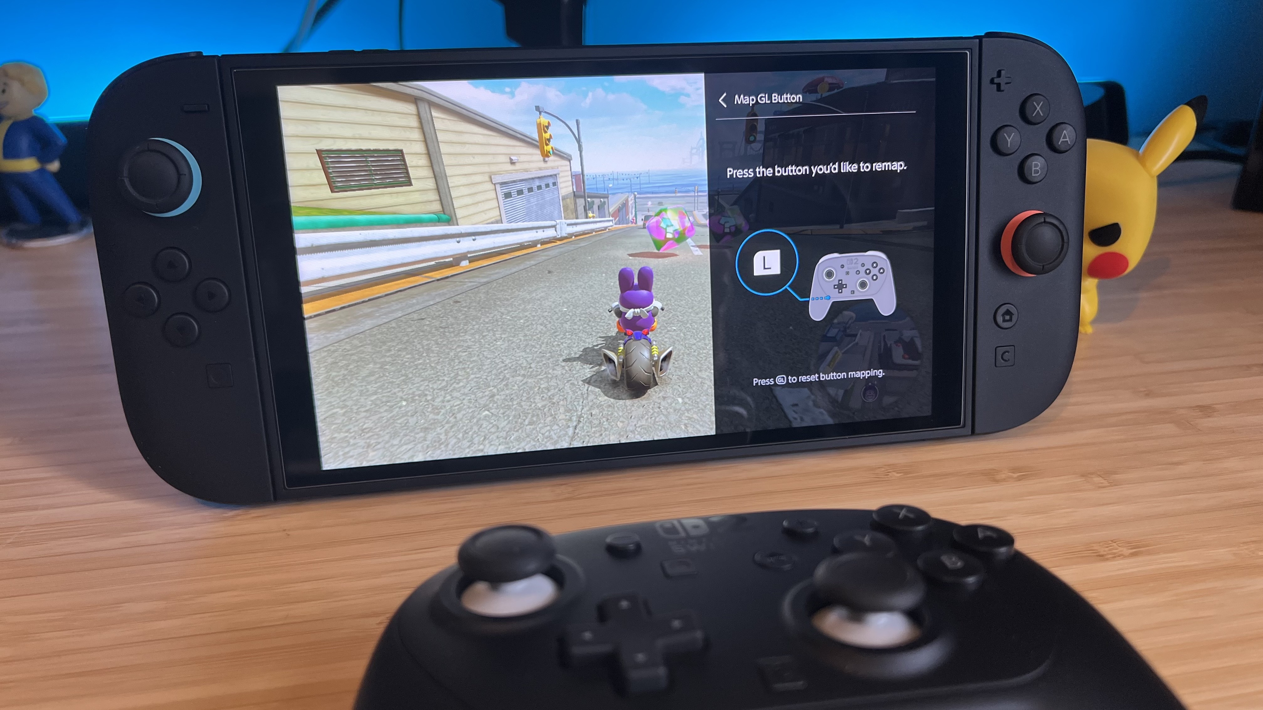 Nintendo Switch 2 showing back button mapping menu over a game of Mario Kart World with Pro Controller in the foreground