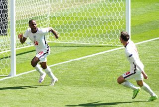 Raheem Sterling, left, scored England's winner with his first tournament goal