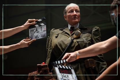 a behind the scenes image of Emma Thompson filming Matilda the Musical surrounded by cameras