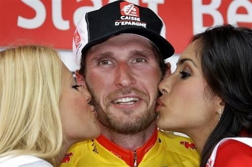 A double smooch for the winner.