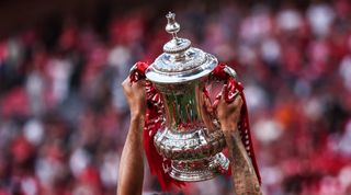 The FA Cup trophy is lifted, May 2022.