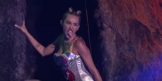 Miley Cyrus sticking out her tongue in 2013 Blurred Lines VMAs performance screenshot