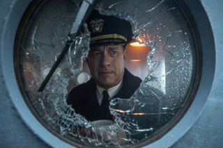 Tom Hanks as Captain Krause stares through a shattered window in Greyhound