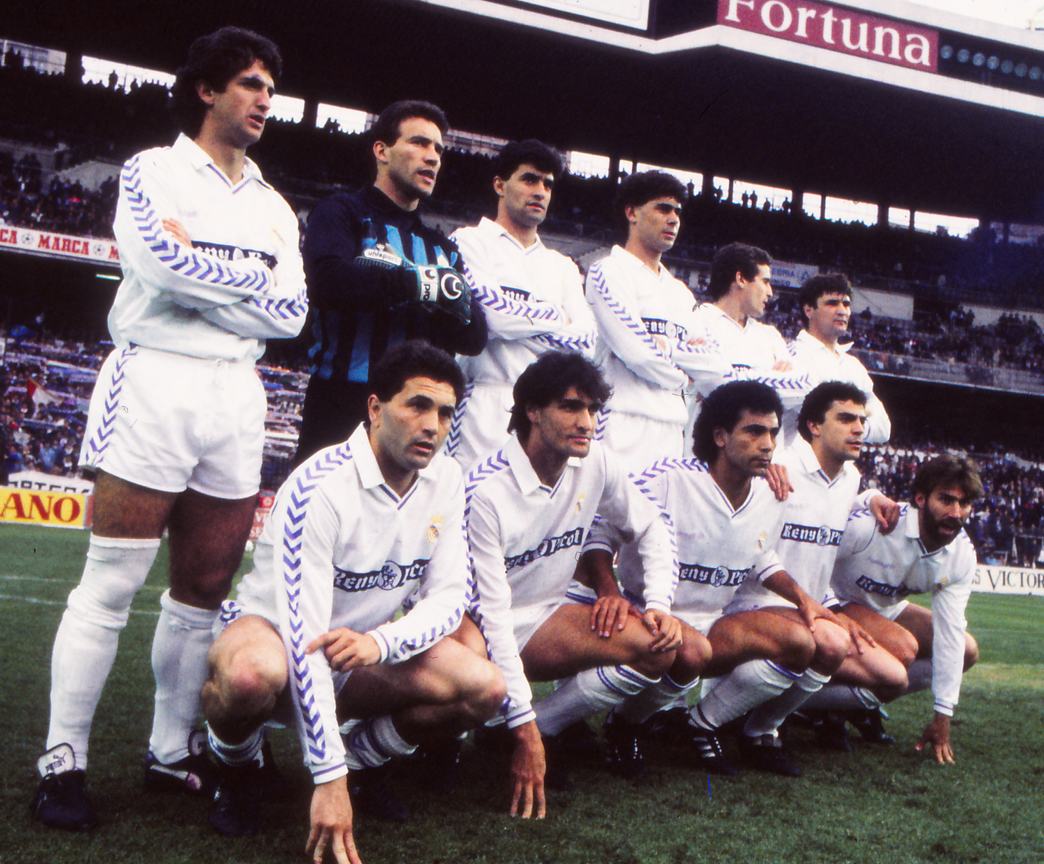 Real Madrid players line up ahead of a match in 1990.