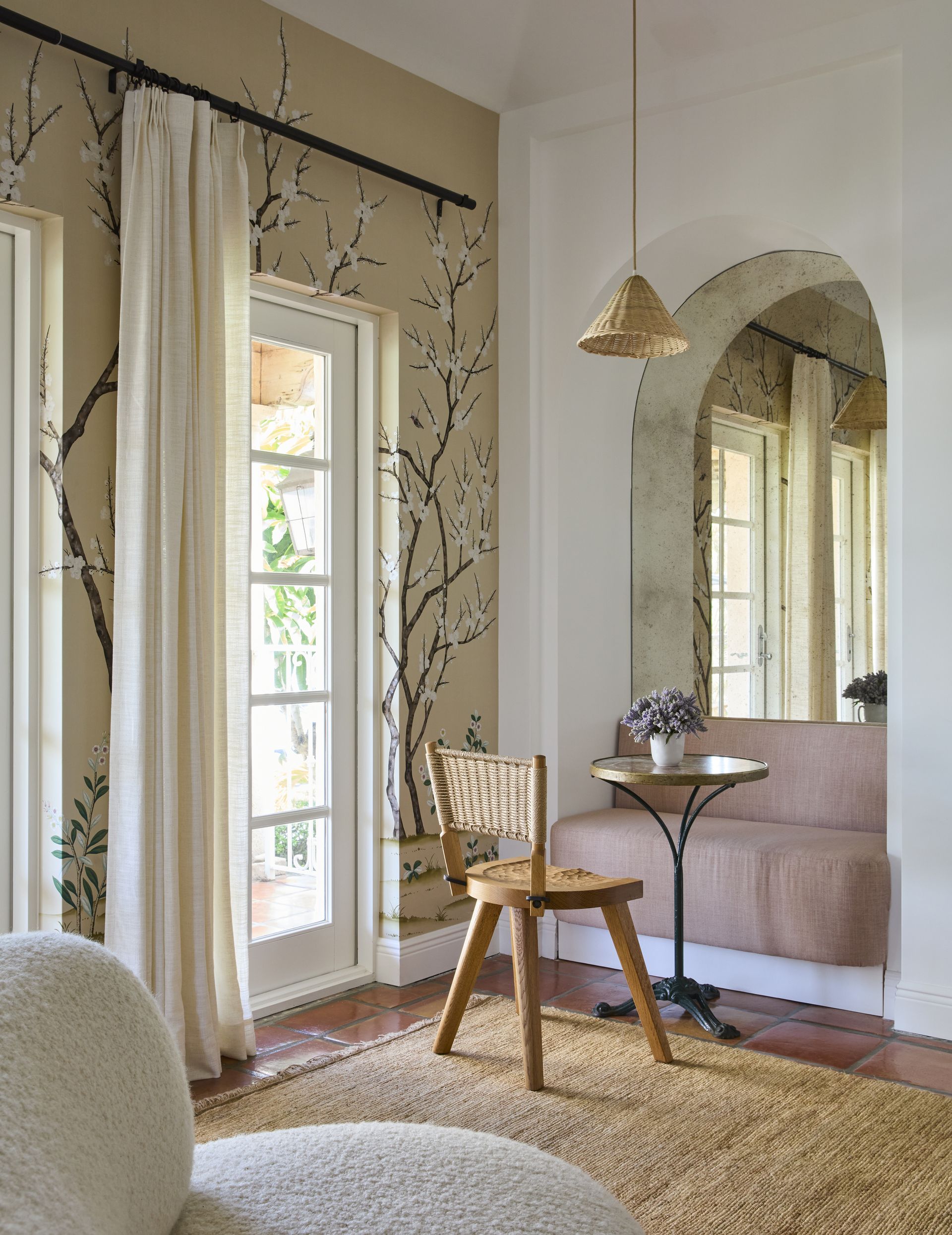 bedroom with dressing table and floral wallpaper
