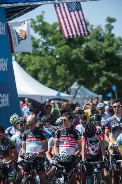 Chris Horner (Radioshack-Nissan) and teammate Matthew Busche on the start line for the national anthem.