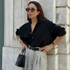 woman in black shirts and linen pants