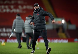 Jurgen Klopp celebrates Liverpool's recent home win over Tottenham